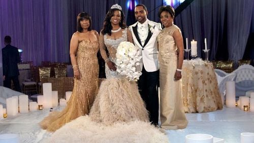 Kandi Burruss with her husband Todd Tucker and the mom in laws. As you can see, Mama Joyce is thrilled to pieces! CREDIT: Bravo