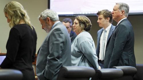 Former DeKalb County police officer Robert “Chip” Olsen (far right) stands with his attorneys (from left) Amanda Clark Palmer, Don Samuel, Denise de la Rue and Lukas Alfen in a Decatur courtroom on Monday, September 23, 2019, when jury selection began in his murder trial. Jury selection continued on Tuesday. Bob Andres / robert.andres@ajc.com