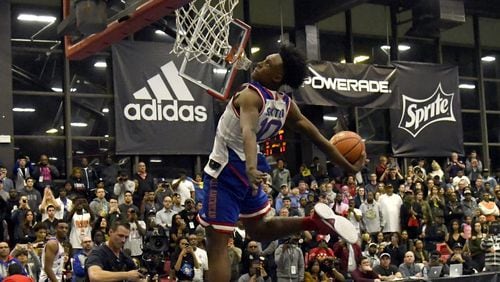 Collin Sexton, of Mableton  dunks during the 2017 McDonald's All American games POWERADE Jam Fest on March 27,  2017,   in Chicago.