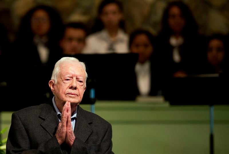 Former President Jimmy Carter teaches Sunday School class at Maranatha Baptist Church in his hometown of Plains, Ga. It was Carter’s first lesson since detailing the intravenous drug doses and radiation treatment planned to treat melanoma found in his brain after surgery to remove a tumor from his liver. (AP Photo/David Goldman, File)