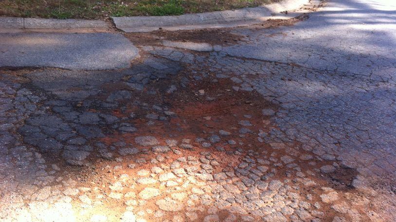A reader hopes a series of potholes will soon be fixed on Stratmor Drive in DeKalb County. Photo/Submitted.