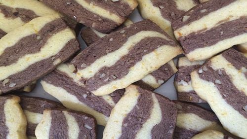 Cardamon, orange and chocolate ribbon cookies are festive and delicious. They go beautifully with a cup of coffee.(Kathy Morrison/Sacramento Bee/TNS)