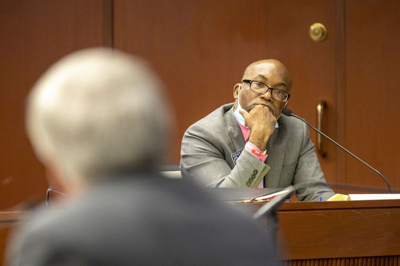 06/19/2020 - Atlanta, Georgia - Sen. Harold Jones II (D-Augusta) questions the proposed amendment provided by Sen. Bill Cowsert (R-Athens), foreground, on HB 426 during a Senate Judiciary committee meeting on day 34 of the legislative session at the Paul D. Coverdell building in Atlanta, Friday, June 19, 2020. Sen. Bill Cowsert (R-Athens) added an amendment to HB 426 that would add first responders to be a protected class in Georgia's proposed hate crime law. The amendment passed the committee with no support from Democrats and will now be presented to the House.(ALYSSA POINTER / ALYSSA.POINTER@AJC.COM)