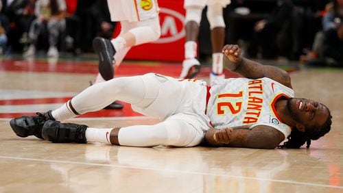 Taurean Prince of the Atlanta Hawks reacts against the Golden State Warriors at State Farm Arena on December 3, 2018 in Atlanta, Georgia.