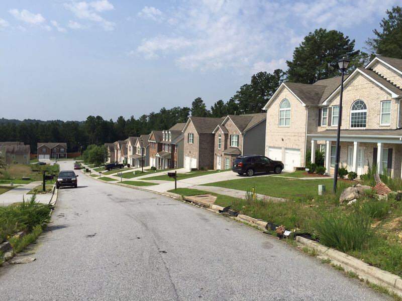 DeKalb County paid developer Vaughn Irons nearly $1 million to finish building six homes in this neighborhood near Lithoina. JOHNNY EDWARDS / JREDWARDS@AJC.COM