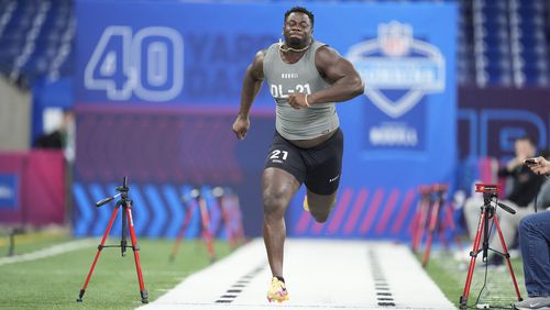 Clemson defensive lineman Ruke Orhorhoro runs the 40-yard dash at the NFL football scouting combine, Thursday, Feb. 29, 2024, in Indianapolis. (AP Photo/Michael Conroy)