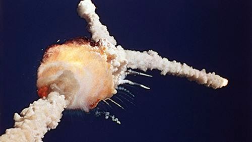 EXPLOSION: In this Jan. 28, 1986 file photo, the space shuttle Challenger explodes shortly after lifting off from the Kennedy Space Center in Cape Canaveral, Fla. (AP Photo/Bruce Weaver, File) ASTRONAUT CREW: This 1986 file photo provided by NASA shows the crew of the space shuttle Challenger, from left, Ellison Onizuka, Mike Smith, Christa McAuliffe, Dick Scobee, Greg Jarvis, Ron McNair and Judith Resnik. (AP Photo/NASA) Lest we forget. The image posted by American Apparel was similar to this one, but had a red background. (File photo)