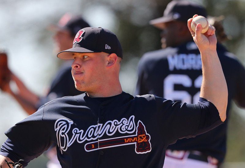  A.J. Minter came to spring training eager to show he was ready to compete at the big-league level. But he developed inflammation in nerves in his pitching arm and was sent to the minors Thursday without throwing a pitch in a Grapefruit League game. (Curtis Compton/AJC photo)