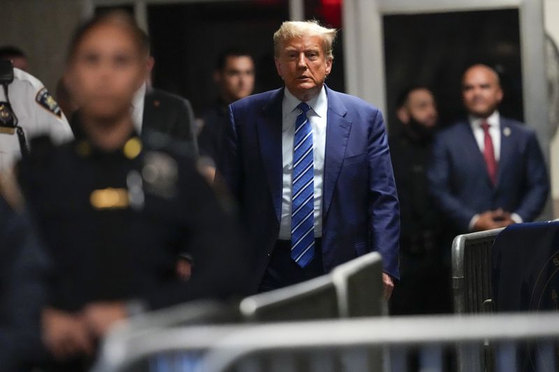 Former President Donald Trump approaches to speak to reporters as he leaves a Manhattan courtroom after the second day of his criminal trial, Tuesday, April 16, 2024 in New York. (AP Photo/Mary Altaffer, Pool)