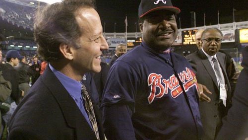 Braves batting coach Don Baylor and NBC announcer Jim Gray chat during the Braves' batting practice prior to Game Three of the World Series at Yankee Stadium on Oct. 26, 1999 in New York City. (PHOTO BY DAVID TULIS/STAFF)