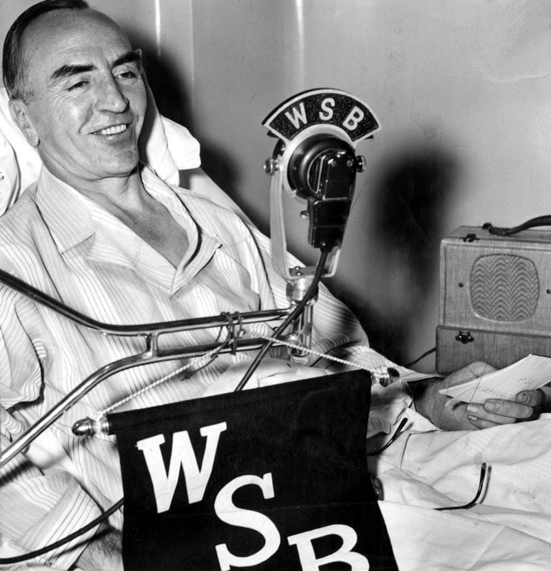 Feb. 1941 - Atlanta, Ga.: Capt. Eddie Rickenbacker, recouperating in Piedmont Hospital from injuries suffered in an airplane crash near Morrow, speaks on WSB-radio from his hospital bed. (AJC staff) 1941