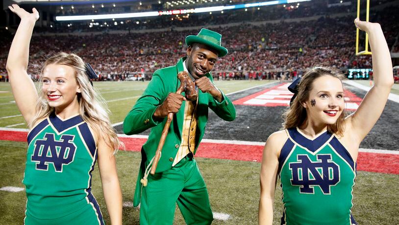 The Notre Dame leprechaun mascot is seen along with cheerleaders during a game against the Louisville Cardinals at Cardinal Stadium on Sept. 2, 2019 in Louisville, Ky.