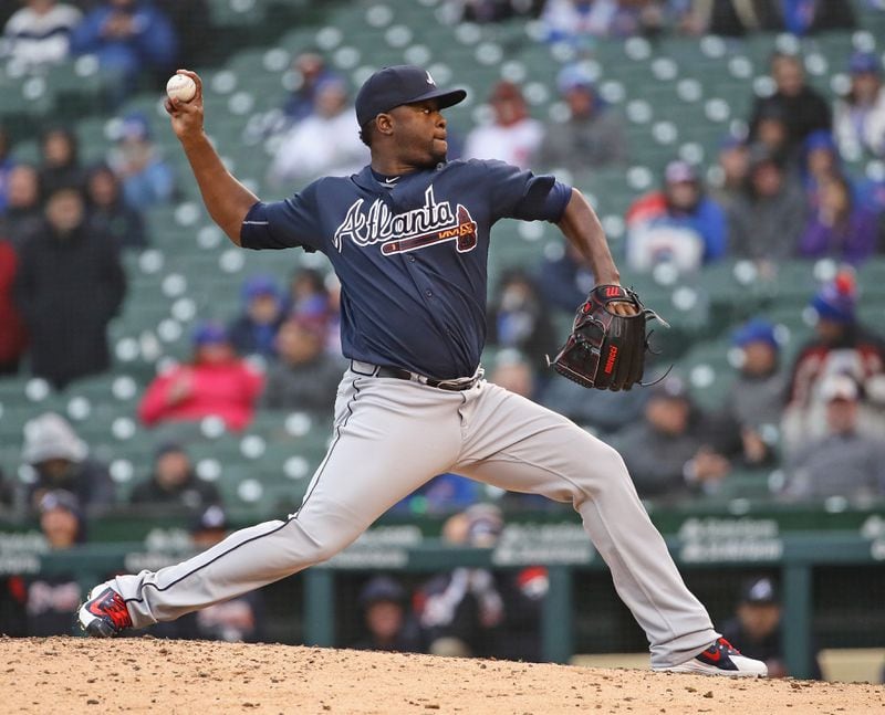 Arodys Vizcaino, pictured in an April game against the Cubs in Chicago, blrew a save against them after giving up two runs in the ninth inning of Tuesday’s night’s 3-2 loss at SunTrust Park. (Photo by Jonathan Daniel/Getty Images)