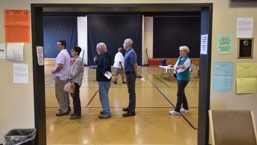 Tucker residents lined up to elect their first city government leaders at The Ministry Center of First Baptist Church of Tucker on March 1. Tucker and existing cities may soon seek to expand. HYOSUB SHIN / HSHIN@AJC.COM