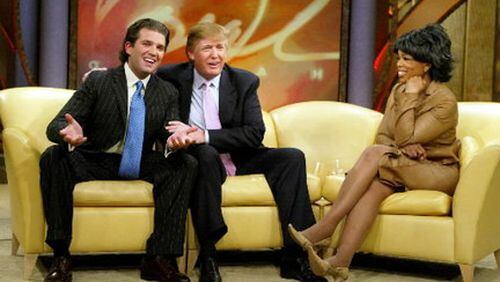 Oprah Winfrey with Donald Trump and Donald Trump Jr. on her former talk show. Associated Press photo