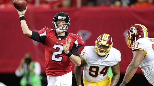 Falcons quarterback Matt Ryan throws an incomplete pass under pressure from Redskins linebacker Preston Smith in an NFL preseason game on Aug. 11, 2016.