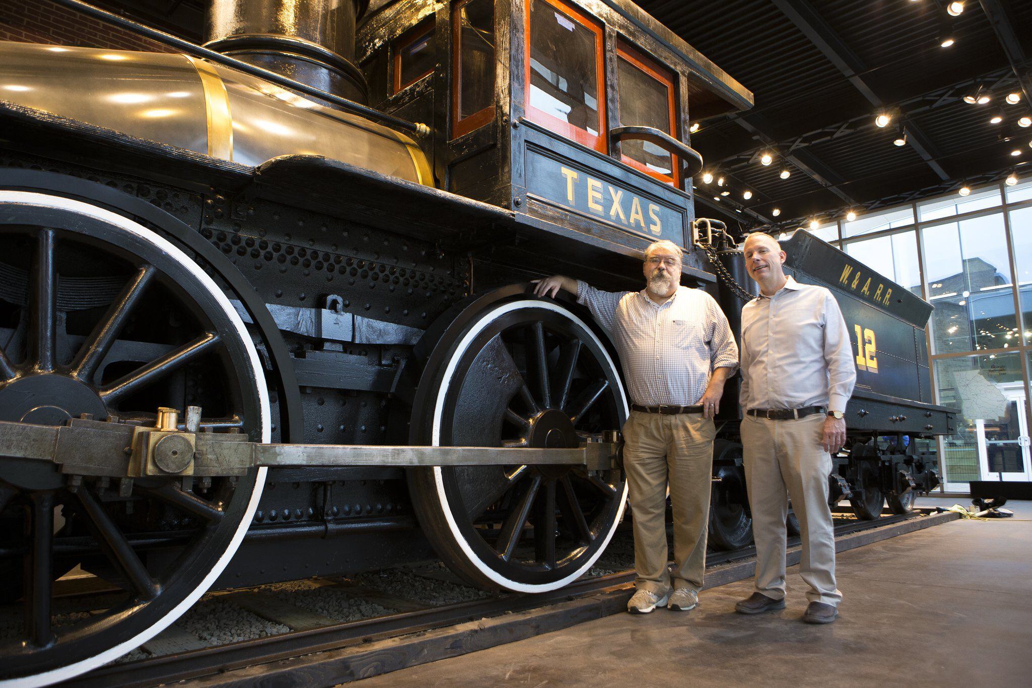 Confederate-era train paired with Zero Mile marker in exhibit