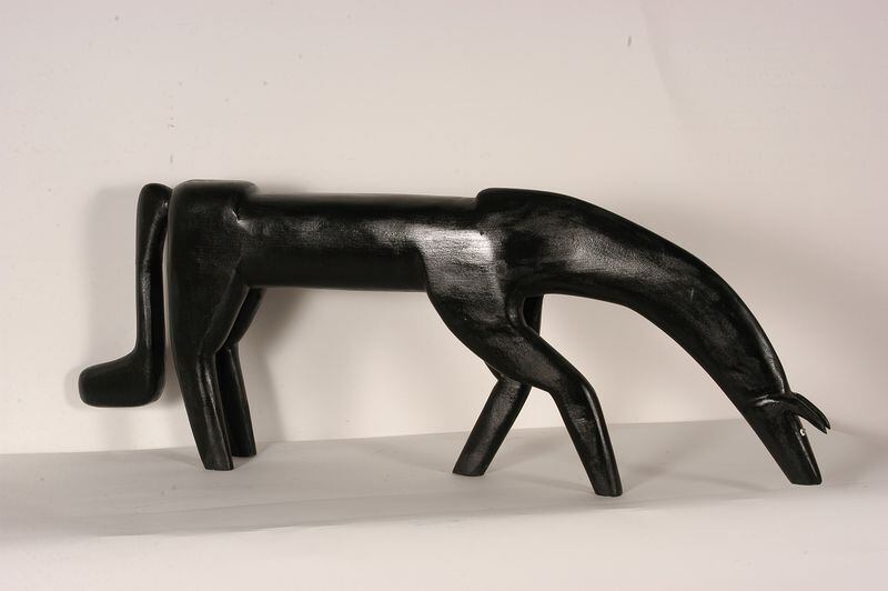 A horse created by Kentucky carver Minnie Adkins. Different from those created by her late husband Garland Adkins, which featured "broomstick" tails, Minnie's horses have more of a curved, sweeping tail. CONTRIBUTED BY SLOTIN FOLK ART