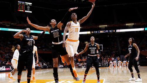 Tennessee guard Diamond DeShields (11) puts up a shot as she's defended by South Carolina forward A'ja Wilson (22) in the first half of an NCAA college basketball game Monday, Feb. 15, 2016, in Knoxville, Tenn. (AP Photo/Wade Payne)