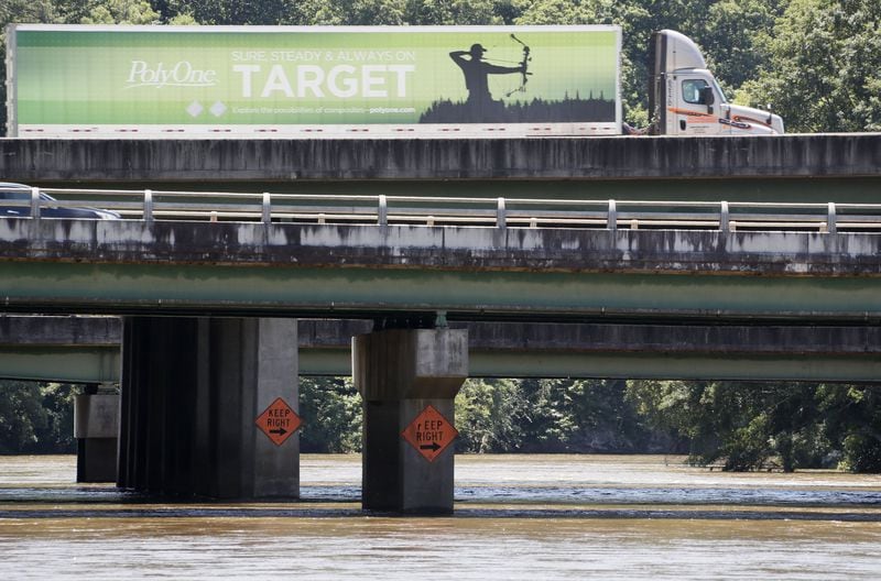 Traffic crosses the bridges on I-285 and Interstate Parkway North over the Chattahoochee River. High water levels are making it unsafe to swim or boat in the Chattahoochee River. BOB ANDRES / BANDRES@AJC.COM