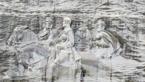 A proposal presented this past week would seek big changes at Stone Mountain, including a plan to confine many of the tributes to the Confederacy to a 40-acre section of the 3,400-acre park. (Hyosub Shin / Hyosub.Shin@ajc.com)