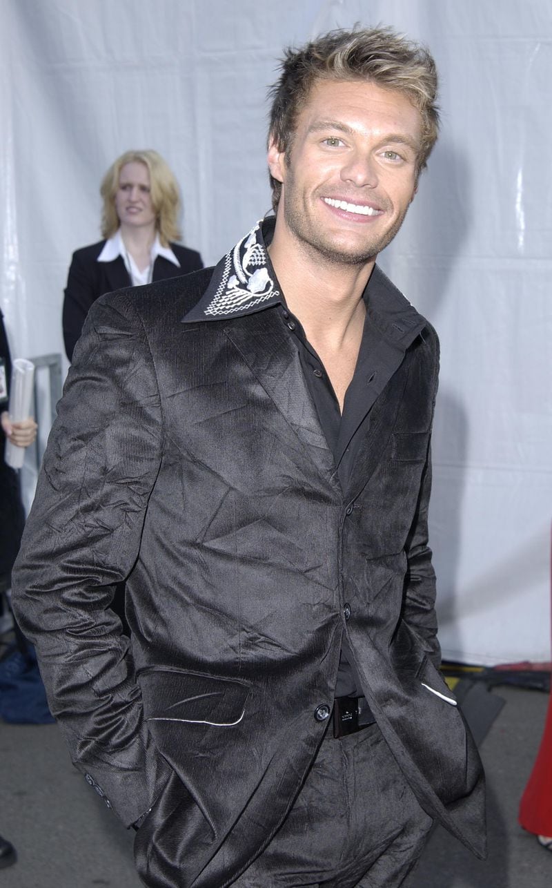  LOS ANGELES - JANUARY 13: Radio D.J. Ryan Seacrest attends the 30th Annual American Music Awards (AMA) at the Shrine Auditorium on January 13, 2003 in Los Angeles, California. (Photo by Robert Mora/Getty Images)