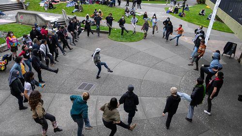 Students and community members perform a traditional Palestinian dance called dabke in support of pro-Palestinian protesters barricaded inside Siemens Hall at Cal Poly Humboldt in Arcata on Tuesday, April 23, 2024. (Paul Kitagaki Jr./The Sacramento Bee/TNS)