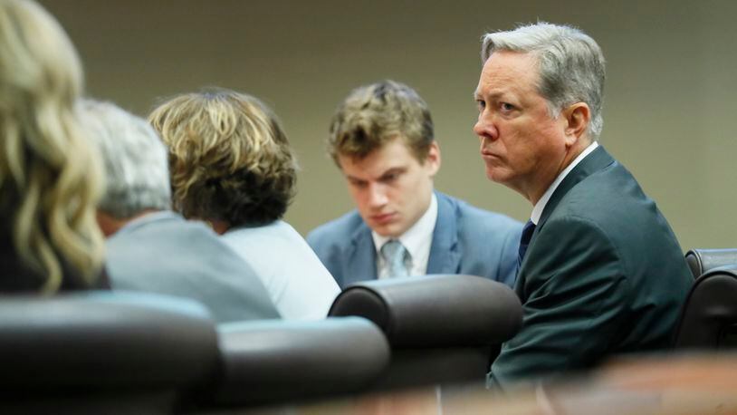 September 23, 2019 - Decatur -  Former DeKalb County Police Officer Robert "Chip" Olsen (right) sits with his attorneys, including Lukas Alfen, as the first jury panel was seated in the court for voire dire.   Jury selection began this morning in his murder trial.  Judge LaTisha Dear Jackson also ruled on motions that were filed in the case on Friday.  Bob Andres / robert.andres@ajc.com