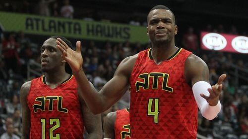 Atlanta Hawks forward Paul Millsap reacts after a referee made a call in an NBA game between the Atlanta Hawks and Cleveland Cavaliers at Phillips Arena in Atlanta, Georgia, on April 9, 2017. The Hawks won in overtime 126-125 after coming back from being 26 points down in the fourth quarter. (HENRY TAYLOR / HENRY.TAYLOR@AJC.COM)