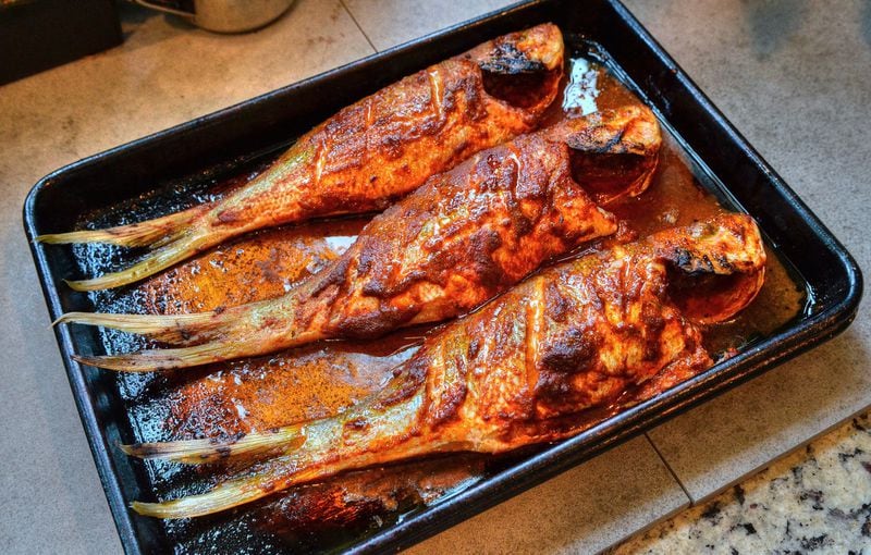 During Asha Gomez’s recent trip to her native Kerala, India, she watched the fishing boats leave early, then come back with their haul later in the day. Here is Gomez’s Spice-rubbed Roasted Snapper. STYLING BY ASHA GOMEZ / CONTRIBUTED BY CHRIS HUNT
