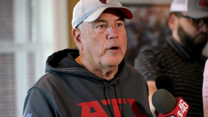 Atlanta Falcons defensive coordinator Dean Pees is interviewed by members of the media during OTAs on May 26 in Flowery Branch. (Jason Getz / Jason.Getz@ajc.com)
