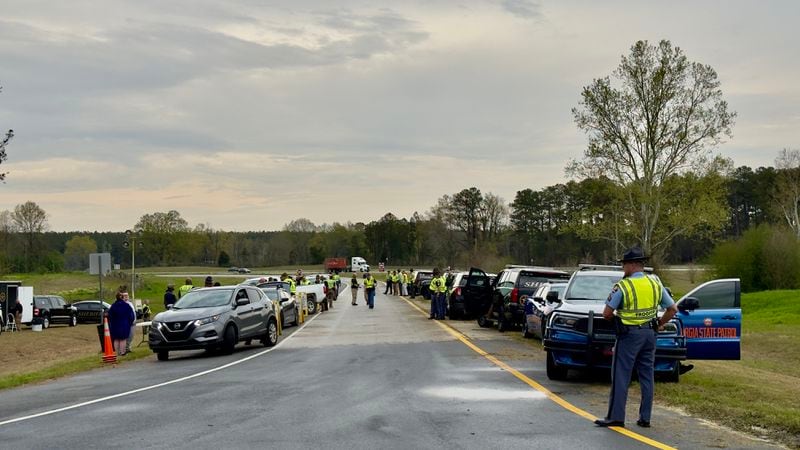 Police along I-16 in Twiggs County last weekend during the annual St. Patrick's Day license check and sobriety checkpoint they set up at an exit southeast of Macon. (Joe Kovac Jr. / joe.kovac@ajc.com)