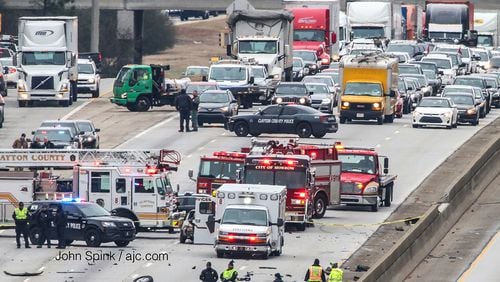 Authorities investigated a deadly crash on I-75 North in Clayton County on Monday. JOHN SPINK / JSPINK@AJC.COM