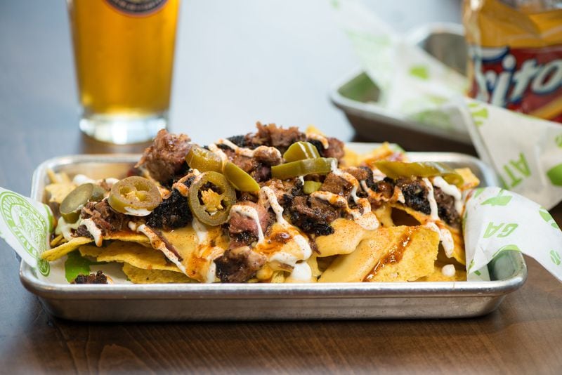  BBQ Nachos with chopped brisket, signature BBQ sauce, cheese, jalapenos and sour cream.Photo credit-Mia Yakel.