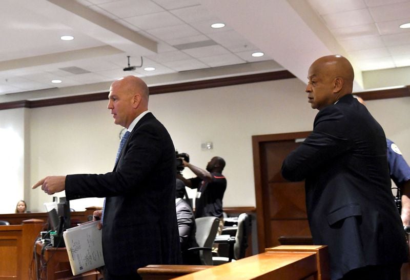 Attorney Noah Pines (left) and Dekalb County Sheriff Jeff Mann (right) walk into the courtroom at the Atlanta Municipal Court in Atlanta on July 27, 2017. DeKalb County Sheriff Jeff Mann pleaded guilty Thursday to charges of obstruction and prohibited conduct stemming from his arrest in Piedmont Park. Mann was sentenced to pay fines of $2,000 and serve 80 hours of community service. He was also banished from city of Atlanta parks for six months. (photo by Rebecca Breyer/freelance photographer)