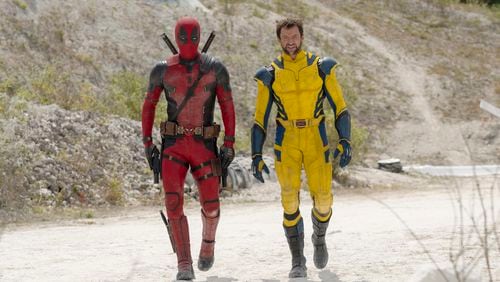 This image released by 20th Century Studios/Marvel Studios shows Ryan Reynolds as Deadpool/Wade Wilson and Hugh Jackman as Wolverine/Logan in a scene from "Deadpool & Wolverine." (20th Century Studios/Marvel Studios via AP)