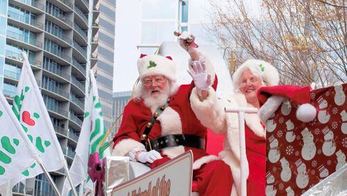 Santa and Mrs. Claus ride into Atlanta during the Children’s Christmas Parade. CONTRIBUTED BY CHILDREN’S HEALTHCARE