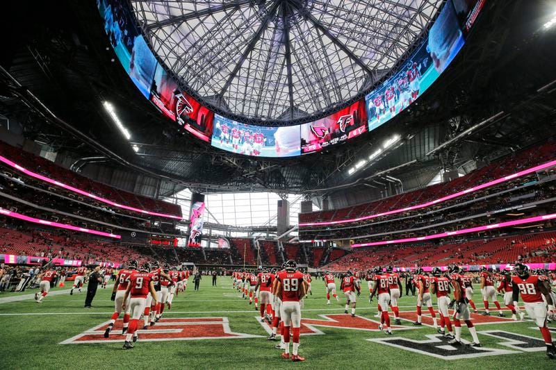8/26/17 - Atlanta, GA - Falcons players take the field for the first time in uniform for pregame warmups. The first game in Mercedes-Benz Stadium  was Saturday, as the Atlanta Falcons played Arizona in an exhibition game.. BOB ANDRES  /BANDRES@AJC.COM