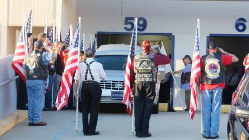The remains of Korea War vet Cpl. Terrell J. Fuller, who went missing 67 years ago, arrived at the airport Thursday morning and was escorted to his hometown of Toccoa, where residents gathered for a hero's welcome. Bob Andres / bandres@ajc.com