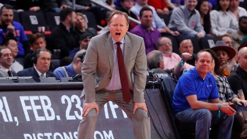 Atlanta Hawks head coach Mike Budenholzer watches against the Detroit Pistons in the second half of an NBA basketball game in Detroit, Wednesday, Feb. 14, 2018. (AP Photo/Paul Sancya)