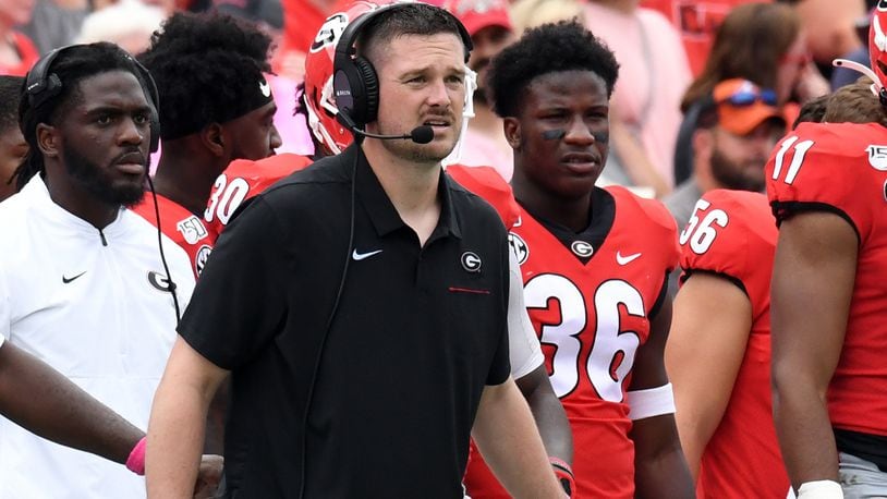 Georgia defensive coordinator Dan Lanning (black shirt) is back to oversee the Bulldogs' defensive pursuits for a third season after turning down lucrative offers to leave for Florida State and Texas the past two years.  (Perry McIntyre/UGA)