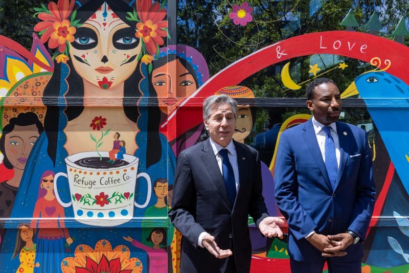  U.S. Secretary of State Antony J. Blinken and Mayor Andre Dickens talk outside the Refuge Coffee in Atlanta Saturday, May 8, 2023. (Steve Schaefer/steve.schaefer@ajc.com)
