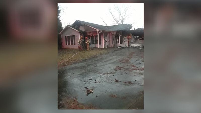 A man was able to escape with his pet bird when a fire broke out in the garage of his Stallion Run home outside Lawrenceville, but his dog did not survive. (Photo: Gwinnett County Fire and Emergency Services)