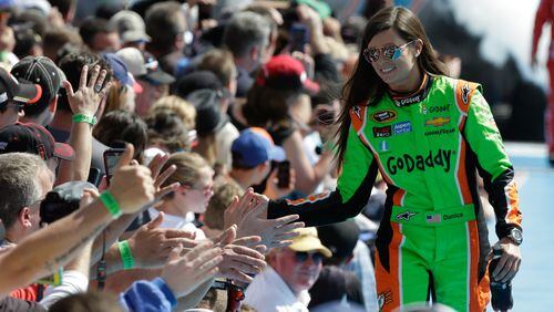 Danica Patrick greets her people before the start of a Daytona 500. (AP Photo/John Raoux)