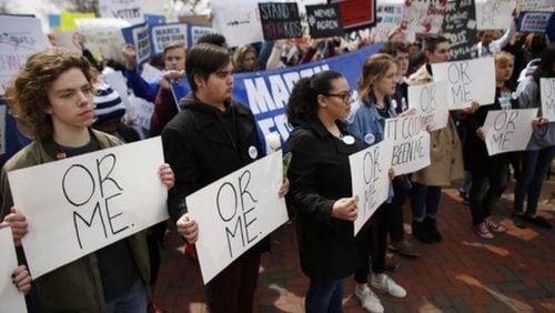 Colorado students hold signs at one of the thousands of 'March For Our Lives' events held in the wake of the deadly Parkland high school shooting in February.