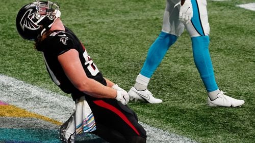Falcons tight end Hayden Hurst (81) reacts to missing a pass in the end zone against the Carolina Panthers during the second half Sunday, Oct. 11, 2020, at Mercedes-Benz Stadium in Atlanta. The Falcons are 0-5 to start the season. (Brynn Anderson/AP)