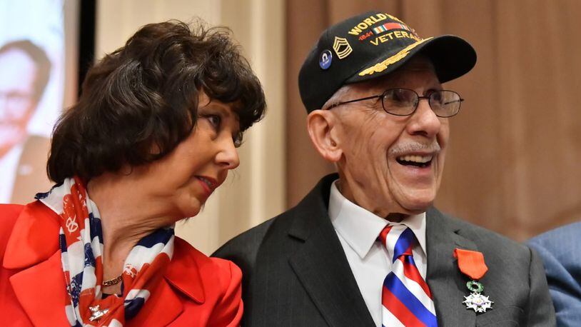 Louis Graziano, a 98-year-old World War II veteran who is believed to be the sole surviving witness to the Nazi surrender in 1945, received the French Legion of Honor at a moving ceremony in Thomson Friday. (Hyosub Shin/Hyosub.Shin@ajc.com)
