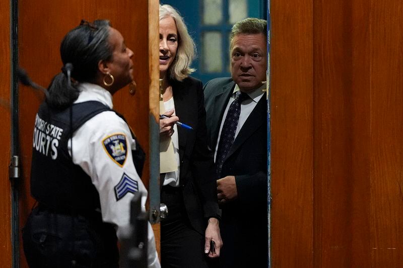 Diana Fabi Samson, second from left, and John Esposito, attorney's for Harvey Weinstein enter Queens criminal court, Thursday, May 9, 2024, in New York. Harvey Weinstein returned to court in New York City as authorities consider an extradition request from California to serve his sentence for a 2022 rape conviction. The 16-year sentence Weinstein received for raping a woman at a Los Angeles film festival in 2013 had been on ice while he served time in New York. (AP Photo/Julia Nikhinson)