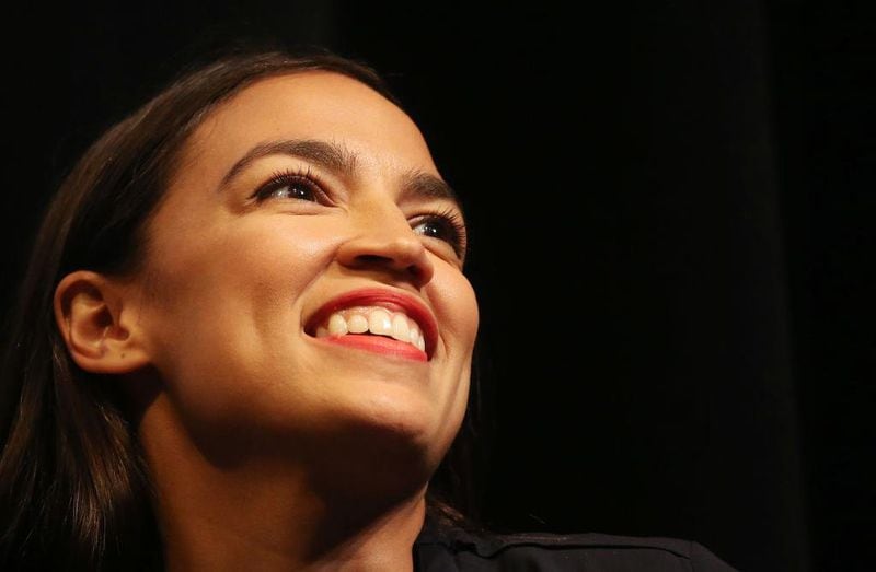 New York U.S. House candidate Alexandria Ocasio-Cortez smiles at a progressive fundraiser on August 2, 2018 in Los Angeles, California. The rising political star is on her third trip away from New York in three weeks and is projected to become the youngest woman elected to Congress this November when she will be 29 years old.