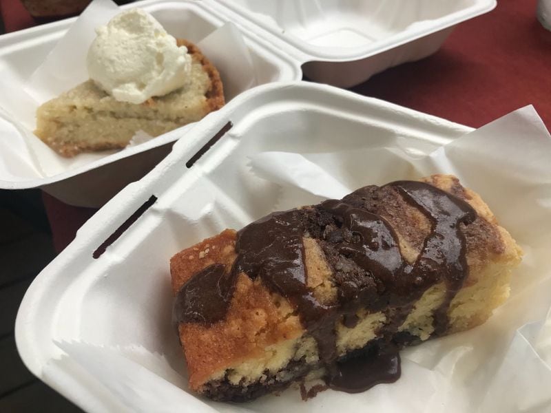 Chocolate-vanilla pound cake (foreground) was among the recent chef’s daily pastries at Pea Ridge. Coconut cream pie (background) is a regular dessert item at the restaurant. LIGAYA FIGUERAS / LIGAYA.FIGUERAS@AJC.COM